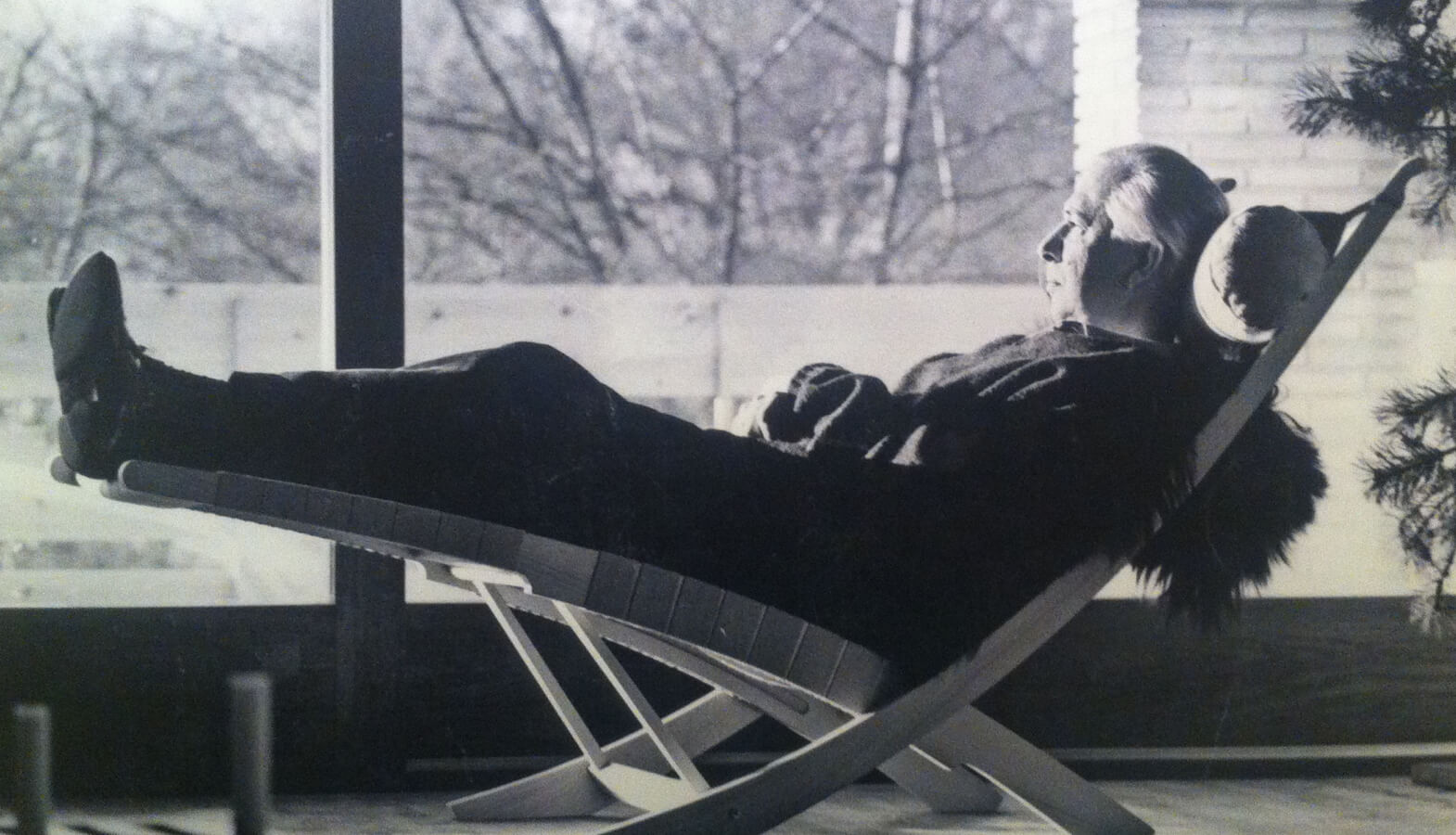Hans Wegner relaxing in his chair